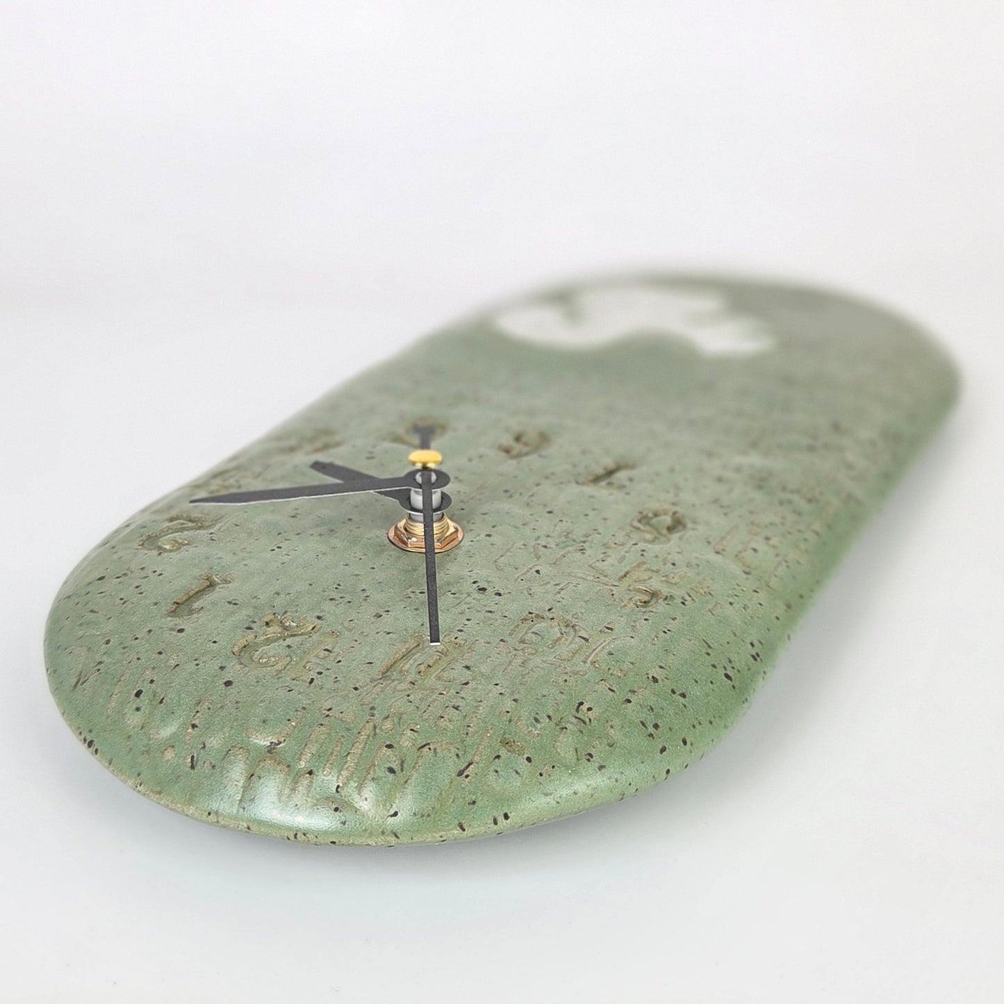 White Squirrel on Green Stoneware Wall Clock