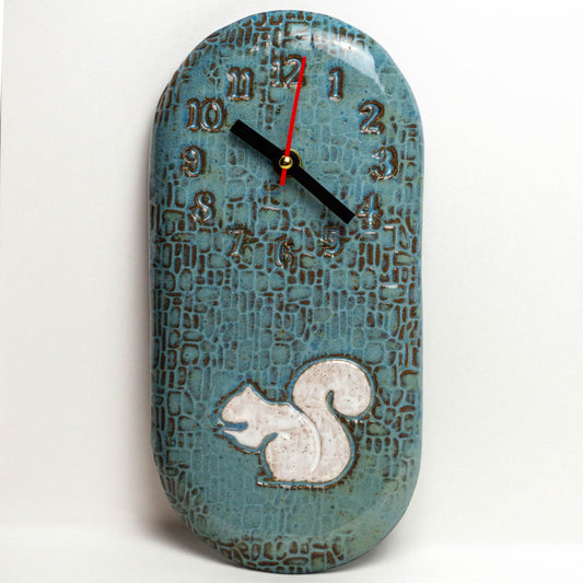 White Squirrel on Blue Stoneware Wall Clock