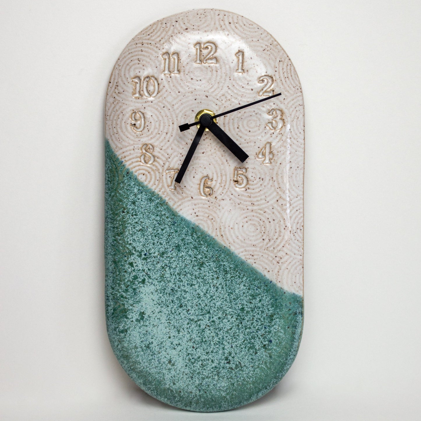 Spiral Pattern Turquoise & White Stoneware Wall Clock