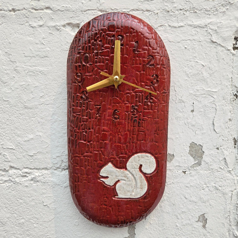 White Squirrel on Cinnamon Stoneware Wall Clock