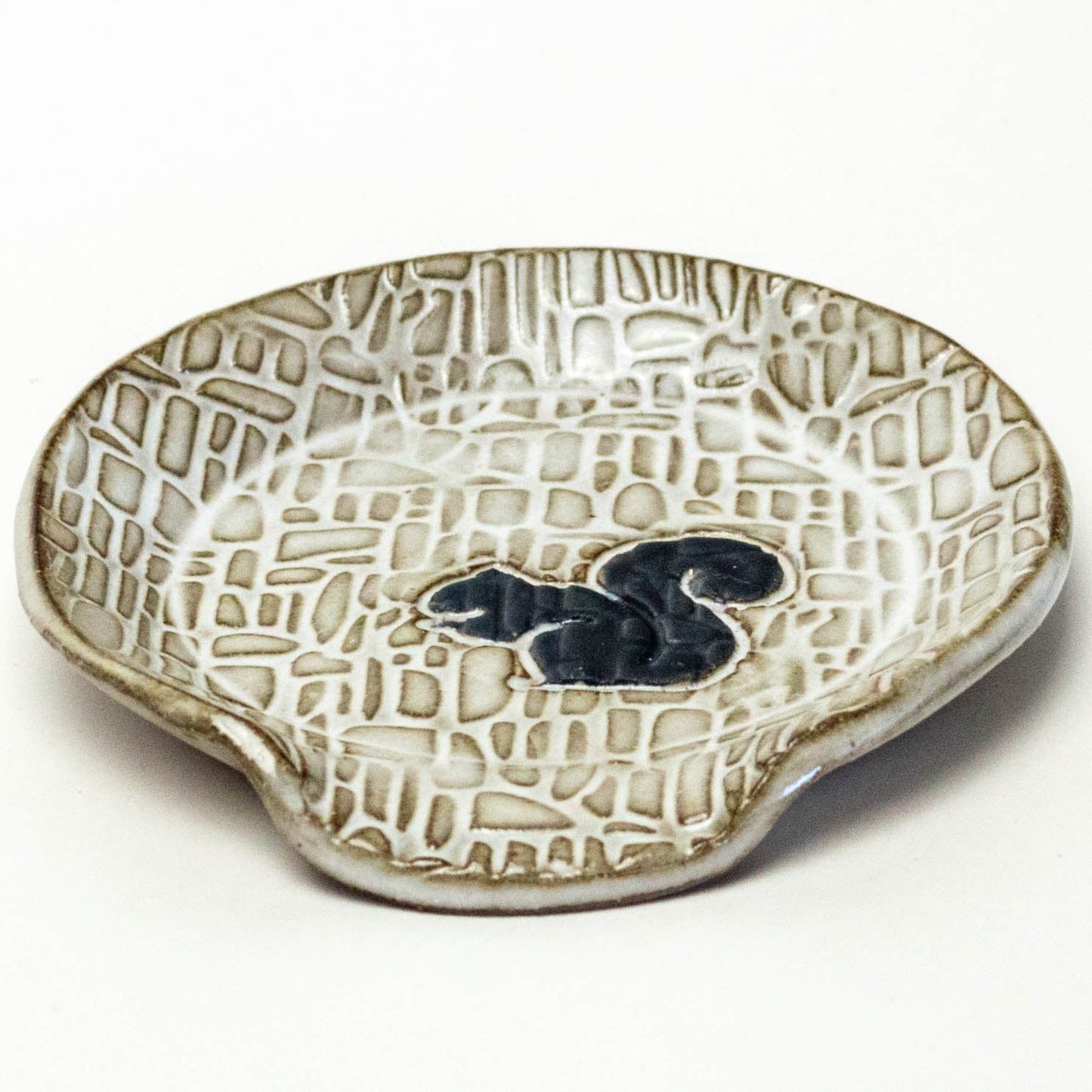 Black Squirrel on White Spoon Rest
